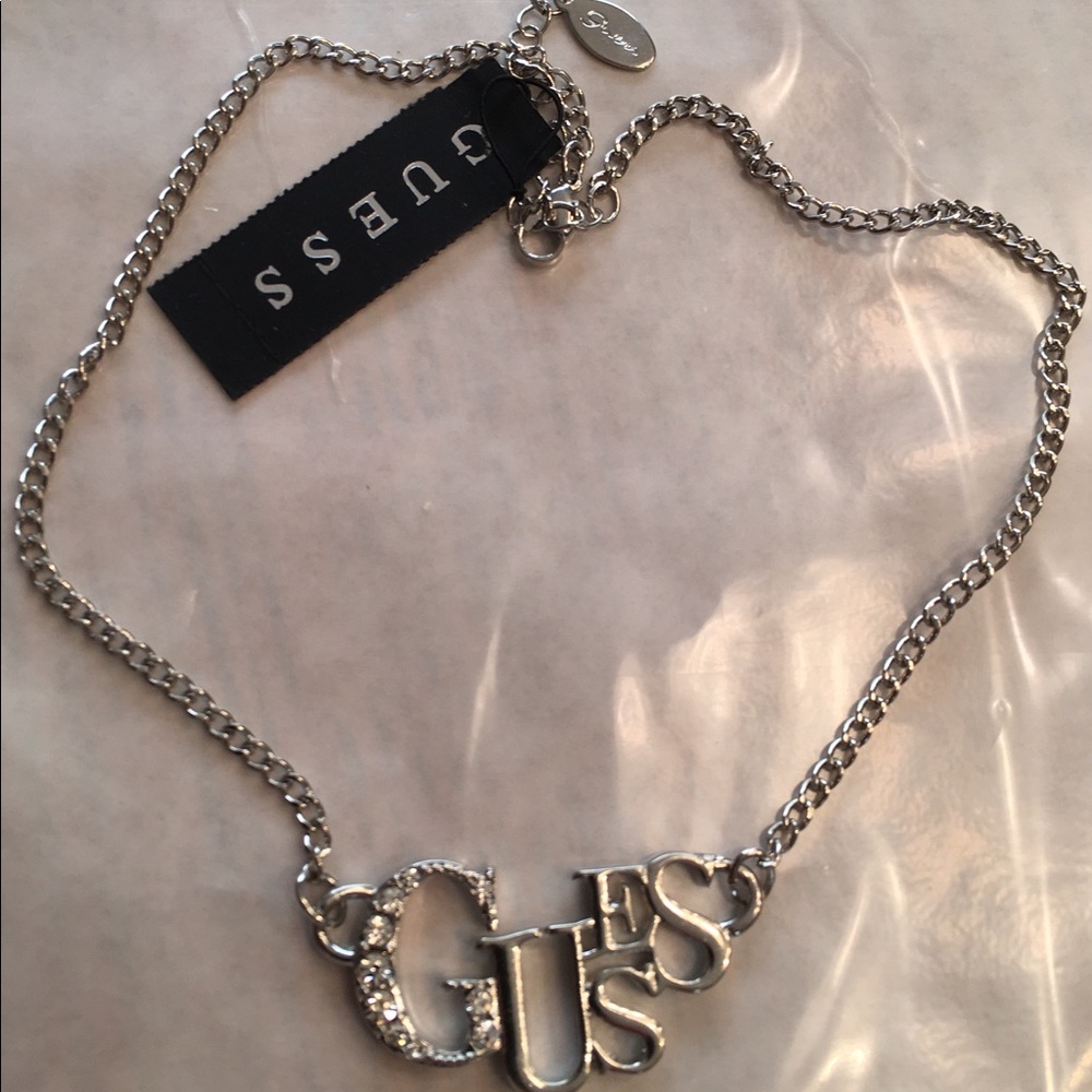 NWT Guess silver tone metal logo necklace